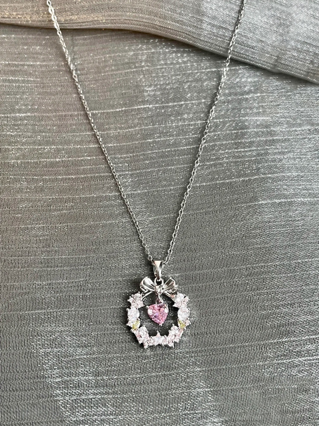 Ethereal Ribbon & Wreath Pendant Necklace – Silver Finish