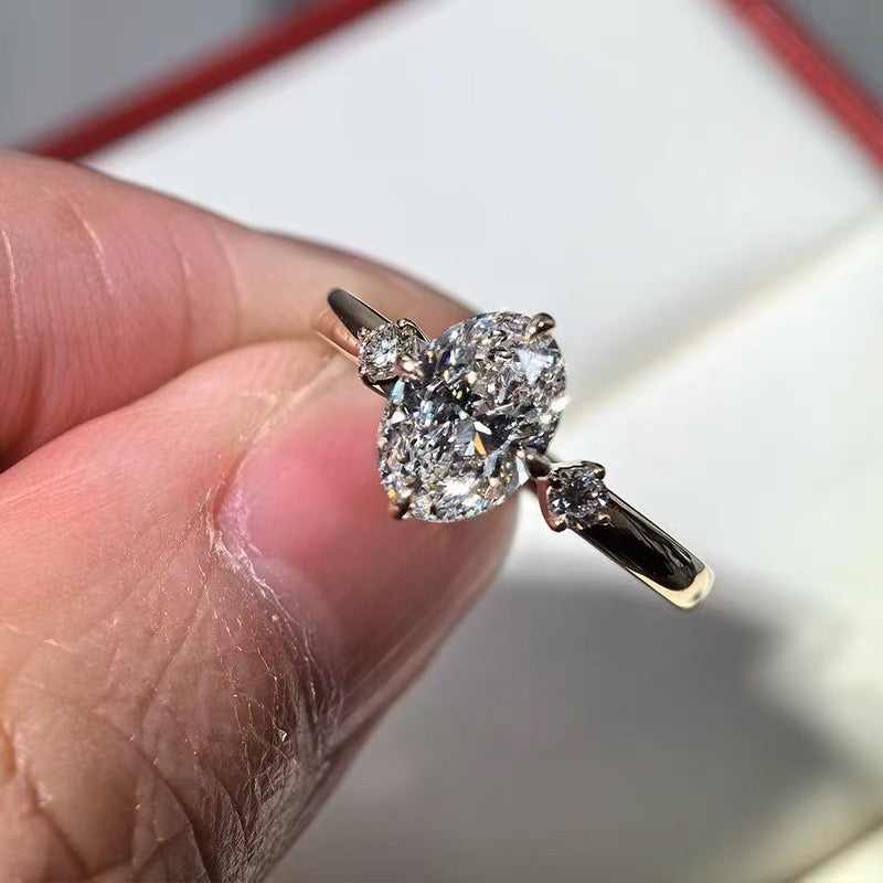 Oval & Pear Three-Stone Ring in Platinum
