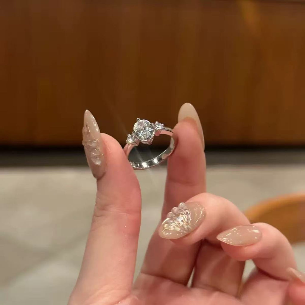 Oval & Pear Three-Stone Ring in Platinum