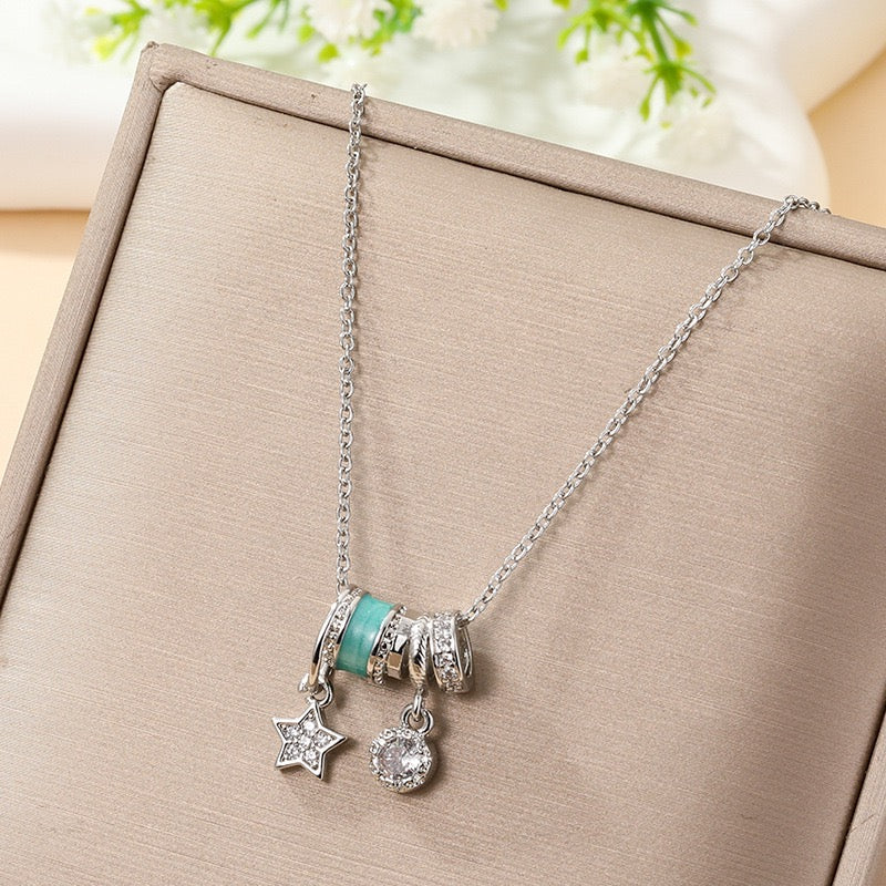 Celestial Charm Pendant Necklace – Silver-Tone with Turquoise Enamel & Sparkling Accents