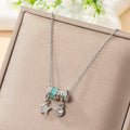 Celestial Charm Pendant Necklace – Silver-Tone with Turquoise Enamel & Sparkling Accents
