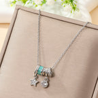 Celestial Charm Pendant Necklace – Silver-Tone with Turquoise Enamel & Sparkling Accents