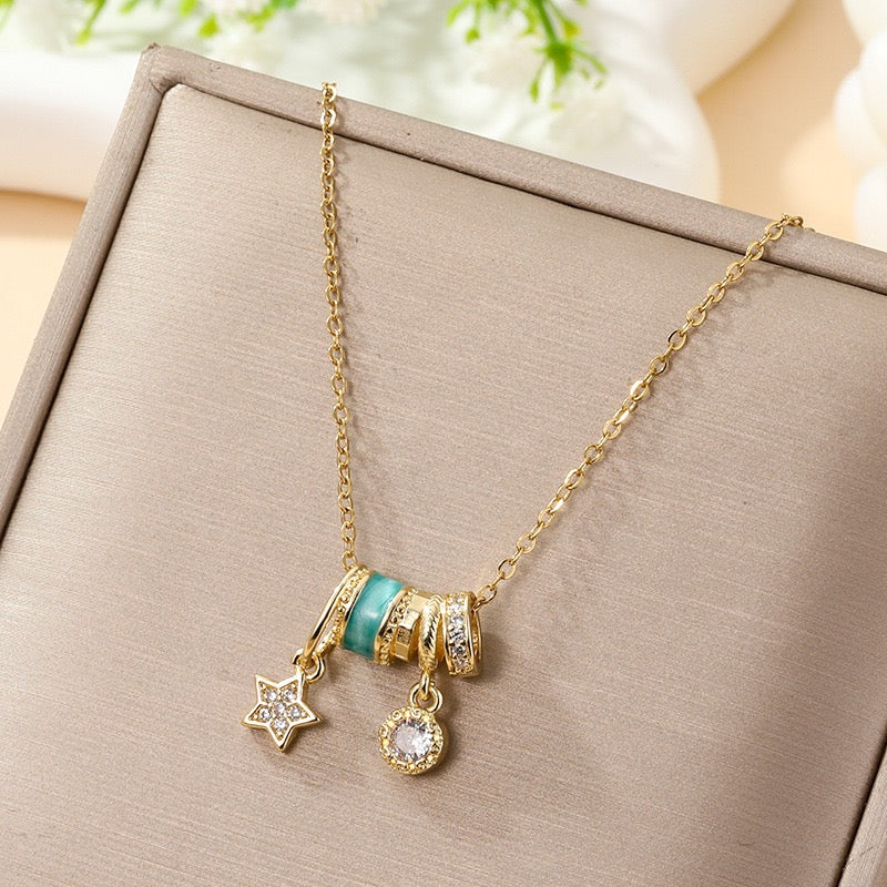 Celestial Charm Pendant Necklace – Silver-Tone with Turquoise Enamel & Sparkling Accents