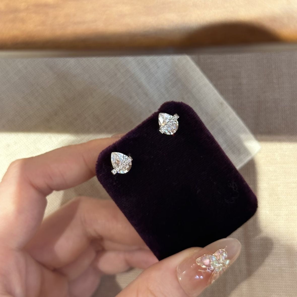 Exquisite Pear-Cut Crystal Stud Earrings with Horizontal Pavé Bar Accents