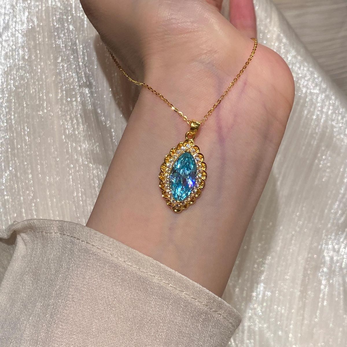 Vintage-Inspired Marquise Blue Topaz and Diamond Halo Pendant Necklace