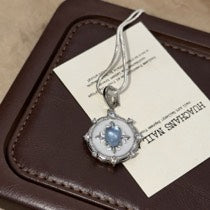 Vintage-Inspired Sterling Silver Oval Blue Star Sapphire and Mother of Pearl Locket Pendant Necklace