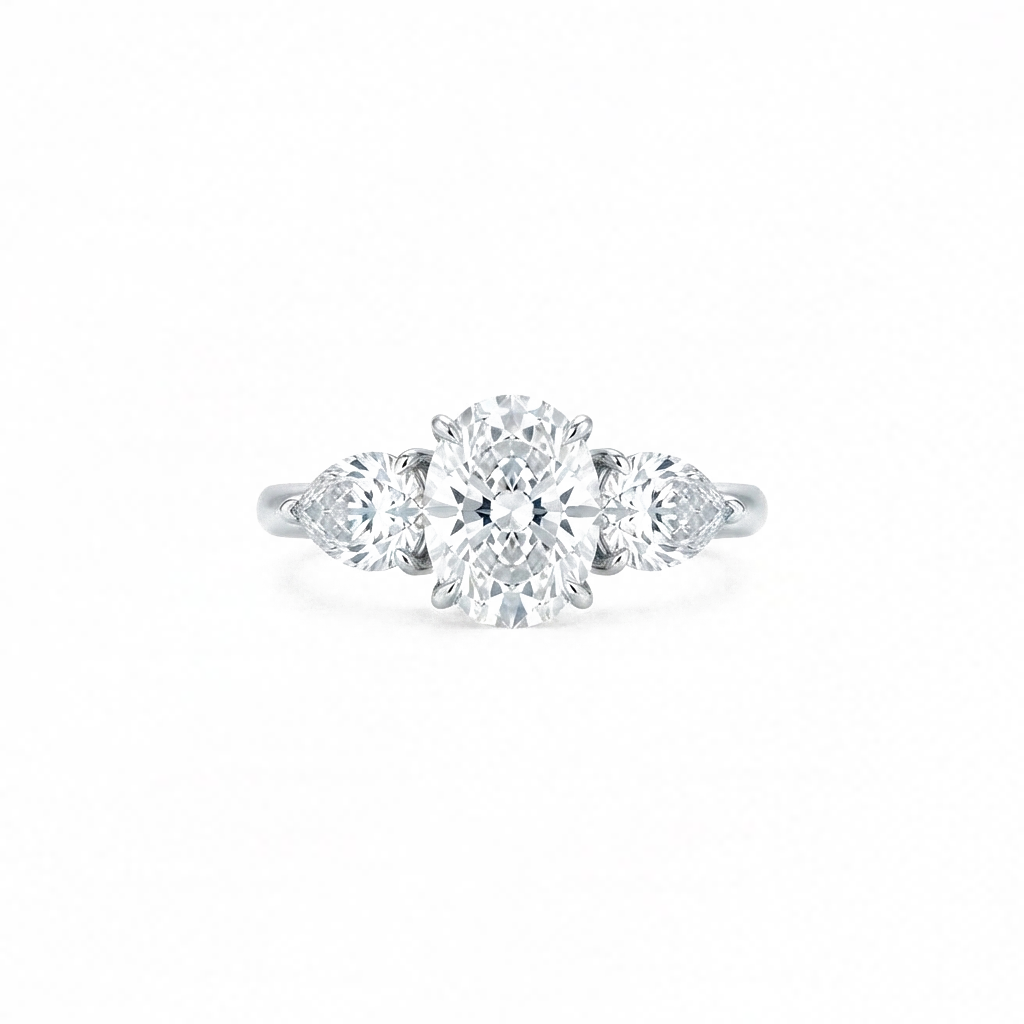 Oval & Pear Three-Stone Ring in Platinum